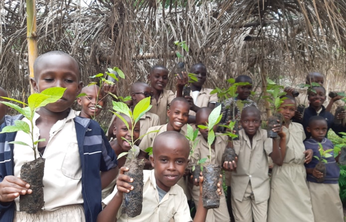 Children enjoying the reforestation program dedicated to schools from Treeapp