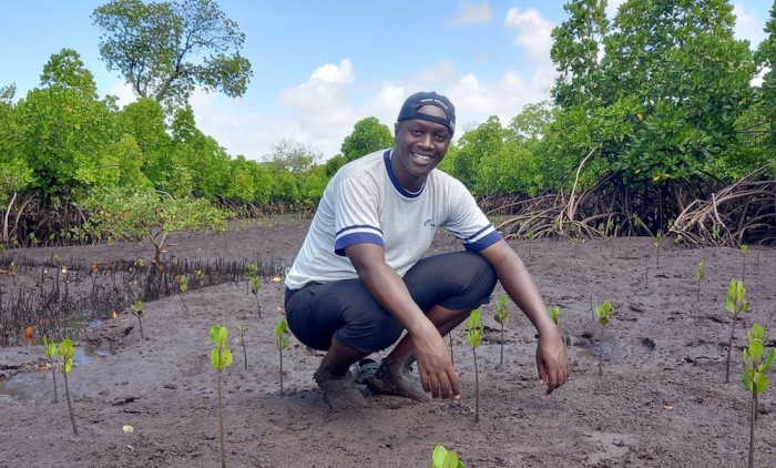 Treeapp planter with 6 month old Mangroves in Kenya in 2021